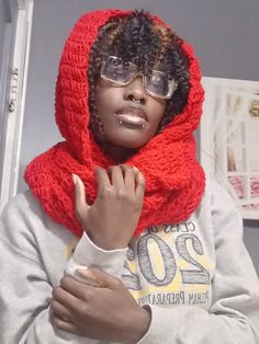 it's an adult size and  wraps around the neck about 2 to 3 times (3 Times for the model).  it also doubles as a little hood  width 14 inches  length 94.5 inches Casual Winter Headwrap One Size, Casual Winter Headwrap One Size Fits Most, Winter Acrylic Infinity Scarf, Handmade Red Scarves For Fall, Trendy Red Scarf, Casual Red Scarf For Cold Weather, Handmade Red Scarf For Fall, Handmade Casual Winter Infinity Scarf, Red Scarves For Winter Cold Weather