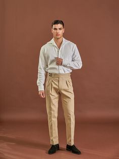 Composition : 100% cottonCountry of Origin : Republic of Korea Classic Single Breasted Bottoms For Business Casual, Classic Single-breasted Bottoms For Business Casual, Classic Semi-formal Bottoms With Buttons, Semi-formal Cotton Pants With Pockets, Classic Cotton Button-up Bottoms, Semi-formal Cotton Bottoms With Pockets, Cotton Bottoms With Button Cuffs And Relaxed Fit, Semi-formal Cotton Bottoms With Belt Loops, Button-up Cotton Bottoms