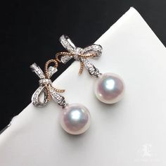 This is a unique earring. All Akoya pearls are imported directly from the pearl farms of Japan. The earring is comprised of the finest quality 18k gold. Please contact us if you have any questions. Remember to mention the product name in your email. Product Information Origin Japan Material Akoya Pearl, 18k White Gold, and Natural Diamond Dimensions Earring Lenght Approx. 2.2cm Pearl Shaped: Round Size: 8-8.5mm Quality: AAA Nacre: Very Thick Color: White Luster: Very High Accessories Metal: 1.86 White Akoya Pearl Drop Earrings, Formal Akoya Pearl White Earrings, Fine Jewelry Akoya Pearl Pear-shaped Earrings, Fine Jewelry Akoya Pearl Pear Earrings, Luxury Round Pearl Drop Earrings, Luxury Pearl Pendant Earrings, Luxury White Pearl Charm Earrings, Rose Gold Akoya Pearl Earrings For Gift, Luxury White Diamond Pearl Earrings