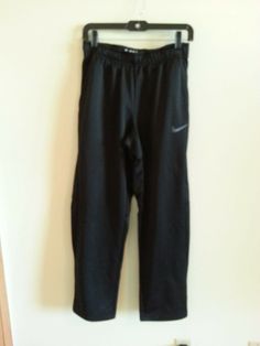 Nike Dri Fit black athletic pants - womens small - unstretched waist = 27", inseam = 29" Nike Micro-elastic Bottoms For Workout, Black Stretch Nike Bottoms, Nike Black Athletic Fit Bottoms, Nike Black Nylon Pants, Nike Bottoms With Elastic Waistband, Short Length, Athletic Pants Womens, Black Athletic Pants, Athletic Pants, Nike Dri Fit