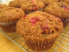 several muffins cooling on a wire rack