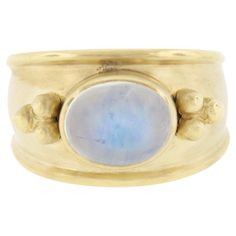 --Stone(s):-- (1) Natural Genuine Moonstone - Oval Cabochon Cut - Bezel Set - Transparent White Color w/ Blue Play - 9.5x7.5mm (approx.) Material: Solid 14k Yellow Gold Weight: 8.61 Grams Ring Size: 6.5 (Fitted on a finger. We can Not custom size this ring.) Ring Width: 12.3mm (0.48') (top of the ring), 5.3mm (bottom of the shank) Ring Height: 7.6mm rise off the finger (at the stone) Signature: MAZ - 14K Condition: Excellent condition! Stock Number: MK-16030259-23061718 Yellow Gold Moonstone Ring With Gemstone Accents, Gold Oval Moonstone Ring With Gemstone Accents, Yellow Gold Oval Moonstone Ring With Gemstone Accents, Yellow Gold Oval Cabochon Moonstone Ring, Oval Cabochon Moonstone Ring In Yellow Gold, Heirloom Oval Moonstone Ring With Multi-stone, Oval Multi-stone Moonstone Rings, Heirloom Multi-stone Moonstone Ring, Oval Moonstone Multi-stone Rings