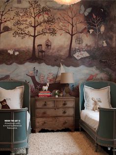 two twin beds sitting next to each other in front of a painting on the wall