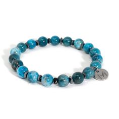 This crystal bracelet is made of natural Blue Apatite and Hematite. The vivid colors of Apatite combined with the metallic luster of Hematite make an exquisite combination. Our Crystal Bracelets are designed to feel lightweight, comfortable, and effortless. Stringing each crystal beads is part of our mindful Intention when we create this bracelet, infusing positive energies, love, and happiness within each design.By combining meaningful symbols and natural crystals, we give this accessory releva Cheap Blue Polished Beads Bracelets, Apatite Bracelets With Natural Stones In Round Beads, Adjustable Blue Apatite Bracelets, Hematite Bracelet, Metallic Luster, Eco Friendly Jewelry, Gemstone Beaded Bracelets, Blue Apatite, Hematite Beads