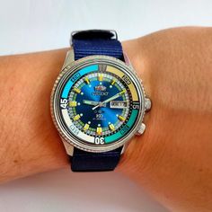 Ultra Rare vintage ORIENT KING DIVER from 70s, Japan watchDay and date calendar, have a button for quick date changeSpecifications:- rare blue dial- mechanical Automatic. Japan movt.- day and date calendar (have a button for quick date change)- shockproof- stainless steel- measures 42 mm case in diameter without crown- 21 jewels- waterproof- large watchAuto-winding watch. Watch are winding while wearing. Wound-up at daytime watch will be working at night. When the watch not start a long time, yo Blue Automatic Round Watches, Retro Automatic Collectible Watches, Blue Automatic Round Watch Accessory, Vintage Blue Chronograph Watch, Vintage Blue Chronograph Watch Accessories, Blue Vintage Chronograph Watch Accessories, Vintage Blue Watch As Gift, Vintage Blue Watch With Subdials, Vintage Blue Watches With Subdials