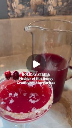 a pitcher of hot honey cranberry margarita