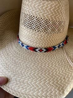 "1/2\" wide All bead work is beaded with 10lb extreme braided nylon line. All hat bands are finished at 23\" with glued than sewed down leather ends and an adjustable leather tie." Adjustable Braided Hat Bands For Rodeo, Adjustable Woven Hat With Flat Crown, Adjustable Multicolor Hat Bands For Rodeo, Adjustable Multicolor Ranch Hats, Adjustable Wide Brim Americana Hat, Americana Wide Brim Adjustable Hat, Adjustable Americana Hat For Rodeo, Adjustable Patriotic Hat For Rodeo, Adjustable Americana Hats For Country Events