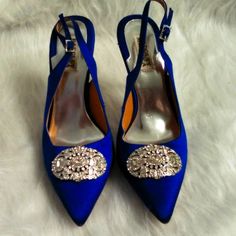 Here Are A Very Nice Pair Of Blue Satin Badgley Mischka Heels Size 9. The Heel Is 4 1/2 Inches High. On The Toes Silver And Diamond Broach.On The Inside Of One Heel Is A Few Scuffs From The Other Heel Accidentally Scratching It. Nearly Noticable. Glamorous Blue Heels For Weddings, Silver Shoe Clips For Evening, Blue Embellished Shoes For Formal Occasions, Blue Embellished Wedding Shoes, Blue Embellished Wedding Shoes For Formal Occasions, Elegant Royal Blue Heels For Evening, Elegant Blue Wedding Shoes With Crystals, Elegant Royal Blue Evening Heels, Elegant Blue Embellished Wedding Shoes