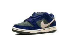 The Nike SB Dunk Low "Deep Royal Blue" is a colorway of the retro skateboarding shoe with a unique arrangement of colors and materials.  Perfect for skating or casual wear, the SB Dunk continues to be among the most popular shoes in the game.  The upper features a Vintage Green suede base and Deep Royal Blue suede overlays.  A Sail leather Swoosh is seen on both sides of the shoe, while white “Nike” branding is embroidered on the navy suede heel tab.  A “Nike SB Dunk” logo can be found on the to Royal Blue Shoes, Most Popular Shoes, Deep Royal Blue, Sb Dunk Low, Nike Sb Dunks Low, Sb Dunk, Nike Sb Dunks, Nike Brand, Blue Nike