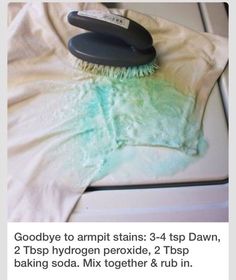 an image of a brush on top of a t - shirt that says goodbye to armpit stains