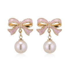 PRICES MAY VARY. Bow Pearl Earrings --- These pearl earrings with a dangling bow are the perfect accessory for any outfit, adding a touch of trendy and unique.It is perfect for date earrings party earring wedding earrings.Fashion and eye-catching design will certainly bring a lot of attention and help you win more praise. Size --- As shown in the figure,Due to manual measurement, there is an error of 1-2cm. Material --- Made of alloy, it is easy and comfortable to wear. Gift --- These gold and s Bride Earrings, Daily Jewelry, Wedding Party Jewelry, Rhinestone Bow, Pink Enamel, Bow Earrings, Christmas Gift Jewelry, Dream Jewelry, Pearl Drop Earrings