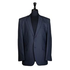 This Chiragh Apparel blazer is an elegant upgrade on dapper tailoring and features rich shades in a sumptuous fabric for elegant opulence. Fashioned from 100% premium quality cotton, this striped blazer features full lining in Japanese silk, a notch lapel, two-button closure and a single-vented back. A left chest pocket and three flap pockets appoint the front while the inside has two (2) pockets on the left and one (1) pocket on the right. A flash of contrast piping is added to the jacket linin Formal Three-piece Suit With Long Sleeves And Pockets, Tailored Three-piece Suit With Long Sleeves For Business Casual, Elegant Navy Blazer For Work, Formal Blue Blazer With Suit Collar, Slim Fit Tuxedo Blazer For Office, Slim Fit Tuxedo Style Blazer For Office, Semi-formal Slim Fit Single Button Outerwear, Slim Fit Single Button Outerwear For Semi-formal Occasions, Single Button Slim Fit Outerwear For Semi-formal Occasions