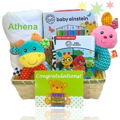 a basket filled with toys and books for baby's first birthday or special occasion