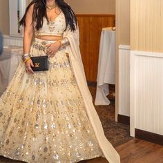 Worn Once In My Reception For 4-5 Hours, Very Good Condition, Blouse Fits Up To 85b Or 37" Inch Bust, Can Be Altered As Required, Lehenga Is One Size Fits All.Dont Have Many Photos If You Want More Videos I Can Send More. Elegant Sequined Traditional Wear For Weddings, Elegant Sequined Traditional Wedding Wear, Glamorous Traditional Wear For Wedding And Festivals, Formal White Semi-stitched Lehenga, Formal White Floor-length Lehenga, Formal Bollywood White Lehenga, Glamorous Wedding Festival Dress, Formal White Lehenga With Dupatta, Gold Lehenga With Sheer Dupatta For Ceremony