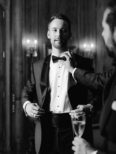 Groom, groom fashion, groom suits, black suit and bow tie, wedding reception, Monique Lhuillier Gowns, Groom Photography, The Chateau, Monique Lhuillier