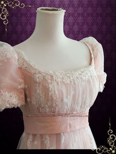 Beautiful lace overlay wedding dress inspired by the regency era. Can also be used as a formal dress for regency ball or special occasion. Photoed in Pink, other colors can be ordered. Working Time: 8-10 weeks Rush Order please inquire prior to order. Custom Designs We specialize in custom design services. If there's a dress you like and it's not on our website, you're more than welcome to email us a picture of the dress for a quote. info@ieieshop.com HAVE QUESTIONS? DROP US A MESSAGE! Other Reg Regency Era Fashion Gowns, 1813 Dress, Regency Inspired Fashion, 1890s Ball Gown, 1800s Ball Gown, Empire Waist Ball Gown, Regency Wedding Dress, Overlay Wedding Dress, Regency Ball Gown