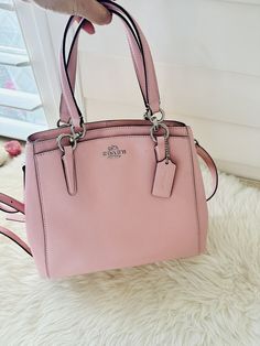 Coach F57847 Crossgrain Leather Minetta Crossbody Shoulder Bag - SV/Blush 2 $325. Color: Silver/Blush Magnetic snap; Adjustable strap; Detachable strap; Zipper; Inner dividers; Inner pockets; Stain-resistant; Key clip; 11.5" (L) x 9.5" (H) x 4 1/4" (Depth) Rainbow Fashion, Key Clip, Signature Canvas, Coach Purses, Pink Fashion, Crossbody Shoulder Bag, Coach Bags, Bags Handbags, Fashion Shoes