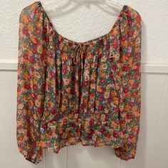 Nwt Lauren Conrad Blouse. Beautiful Floral Print/Green With Peach And Pink Flowers. Green Lining Under Top Except Sleeves Are Sheer. Pit To Pit 19” Length 23” Flowy Feminine Multicolor Top, Feminine Flowy Multicolor Top, Feminine Multicolor Flowy Top, Casual Multicolor Floral Print Peasant Top, Multicolor Long Sleeve Peasant Top For Spring, Pink Floral Print Peasant Top For Fall, Summer Long Sleeve Tops With Floral Print, Feminine Long Sleeve Multicolor Tops, Pink Long Sleeve Peasant Top With Floral Print