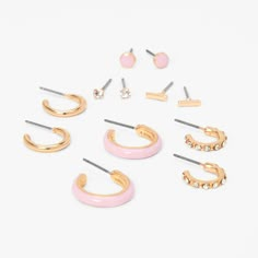 Variety is the spice of life and you're sure to love this collection of hoop and stud earrings in pink, gold-tone, and faux crystal embellished styles. With six designs to choose from, you'll always have the perfect pair for any outfit. Pack Size: 6 Finish: Gold-tone Closure: Post back Material: Metal - Claire's Gold Hoop & Stud Earrings - Pink, 6 Pack Cute Preppy Earrings, Claires Earrings Claire's, Pink Small Hoop Earrings In Metal, Pink Small Hoop Metal Earrings, Small Hoop Pink Metal Earrings, Pink Small Hoop Metal Jewelry, Claire’s Earrings, Walmart Earrings, Pink And Gold Jewelry