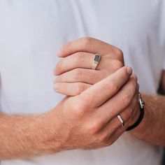 Solidified cremains set in this .925 Sterling Silver Signet-Style Ring which features a Raised 10x7mm Rectangle setting.The inside of the band on this ring can be engraved in block font with up to 12 characters including spaces and symbols, but if you would like to request a longer engraving, please email with inquirie Minimalist White Gold Rectangular Signet Ring, Modern Signet Ring With Rectangular Stone And Polished Finish, Modern Rectangular Signet Ring For Promise, Modern Rectangular Signet Promise Ring, Minimalist Stainless Steel Signet Ring For Promise, Modern Stainless Steel Signet Ring For Anniversary, Minimalist Stainless Steel Signet Promise Ring, Modern Silver Emerald Cut Signet Ring, Minimalist Silver Rings With Rectangular Stone