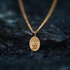 Experience the divine protection and guidance with our solid gold Santa muerte pendant. Expertly crafted in the USA, this exquisite piece honors the revered figure of Santa Muerte, celebrated for bestowing blessings and safekeeping. Made from premium solid gold, it showcases intricate detailing that brings the iconic imagery to life, making it a powerful symbol of faith and devotion. PENDANT INFORMATIONThis pendant is made of real, solid gold.• Made in USA• Material: 14k or 18k solid gold• Finish: polished• Height: 1.25" (31,5 mm) | *includes the small circle, bail dimensions not included• Width: 0.84" (21 mm)• Pendant weight: approx. 8 grams (14k)• Bail: fits up to 4 mm chains• Solid back, not hollow• A certificate of authenticity is included• Delivered in our elegant jewelry box, making Spiritual 14k Gold Medallion Jewelry, Spiritual White Gold Jewelry Tarnish Resistant, Commemorative Medallion Amulet Jewelry, Symbolic Yellow Gold Oval Pendant Jewelry, Spiritual 14k Gold Round Pendant Jewelry, Spiritual Gold Plated Jewelry With Polished Finish, 14k Gold Spiritual Round Pendant Jewelry, Spiritual 14k Gold Round Pendant, Spiritual White Gold Plated Jewelry