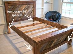 a bed frame made out of wood with measurements for the headboard and foot board