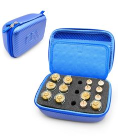 an open blue case with cupcakes inside