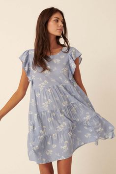 Sweet Surprise Ruffled Floral Babydoll Dress - ShopPromesa Floral Babydoll Dress, Tiered Ruffle Skirt, Baby's Breath, Sweet Dress, Ruffle Skirt, Flutter Sleeves, Printed Mini Dress, Babydoll Dress, Powder Blue