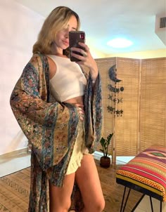 made of light, soft silky fabric, with gold patterns and so many small details that make it that much more goddese  very comfortable to dress.  Comes with matching belt. 🌙 great fot day and  amzing for evening  material-silky polyester🌿 free size-if you ware is open  if closed- good for S ⚛️ Festival Beachwear Kimono With Boho Print, Festival Boho Print Beachwear Kimono, Bohemian Long Sleeve Gold Kaftan, Gold Bohemian Long Sleeve Kaftan, Gold Long Sleeve Bohemian Kaftan, Hippie Festival Robe With Kimono Sleeves, Bohemian Wrap Robe For Festivals, Gold Bohemian Kaftan For The Beach, Gold Bohemian Kaftan For Festival