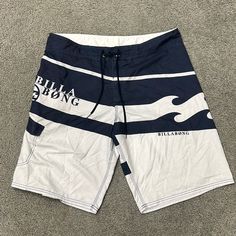 Nwt Mens Size 38 Billabong Board Shorts Tie Waist One Velcro Pocket White Swim Trunks With Pockets For Sports, White Cotton Swim Trunks With Built-in Shorts, Casual White Surfing Bottoms, Casual White Swim Trunks With Pockets, White Casual Cotton Swim Trunks, White Cotton Swim Trunks With Pockets, White Cotton Swim Trunks For Beach Season, Sporty White Beach Bottoms, Casual White Swimming Shorts