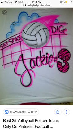 a t - shirt with the word volleyball written in pink and blue ink on it