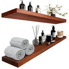 two shelves with towels, soaps and other items on them are shown against a white background