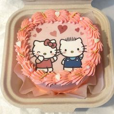 a hello kitty birthday cake in a box