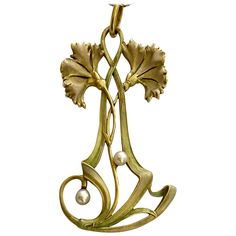 An 18K. Yellow gold pendant, Art Nouveau, attributed to Henry Vever, see The Belle Epoque of French Jewelery 1850-1910, Thomas Heneage & Co Lim. London 1990 page: 207 Paris 1900. weight: 15.58 grams. 2 saltwater pearls of approximately 4 mm (Natural pearls) size: 54 x33x 3. length of necklace: 60 cm. Comes with a certificate from AIG Belgium and with a gold necklace of 60 cm. at the option of the purchaser. In 1900 the world exhibition was held in Paris. All the famous designers of Art Nouveau j Fancy Painting, Paris 1900, Wire Jewelry Patterns, Art Nouveau Necklaces, Bijoux Art Nouveau, Art Nouveau Earring, Art Nouveau Pendant, Saltwater Pearls, Art Nouveau Design