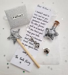 the contents of a personalized christmas ornament laid out on a white table