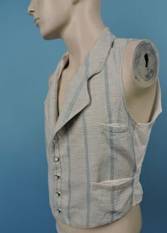 Cotton Button-up Vest With Buttons, Vintage Cotton Vest With Button Closure, Fitted Cotton Button-up Vest, Blue Cotton Vest With Buttons, Blue Button-up Cotton Vest, Fitted Vest With Buttons For Daywear, Fitted Daywear Vest With Buttons, Retro Cotton Vest With Buttons, Vintage Vest With Buttons For Workwear