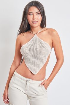 Bring on Summer days! Our Faye Knit Halter Top is the perfect addition to your Summer wardrobe! Featuring a crochet knit material and a sexy cross-back detailing. The ties are adjustable ensuring you with the perfect fit. Dress it up with some matching trousers in the summer, or wear it more casual with your fav YMI denim! Product Details: - Halter Style- Cropped Fit- Triangle Neckline- Crochet Knit Material- Adjustable Tie Back- Model is wearing size Small. Dry clean only.100% Polyester Denim And Crochet, Crochet Halter Top, Ymi Jeans, Crochet Halter, Crochet Halter Tops, Fit Dress, Taupe Color, Halter Style, Knitting Materials