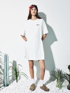 This is a modern and casual t-shirt by MAGOODGAN that is made out of high quality and sturdy fabric. With unique design detail and trendy mood, you can style it for your casual and young daily outfit.- Graphic print on the front and back- Adjustable string on the waist- Two way styling as a dress and a t-shirt Cotton Graphic Print T-shirt Dress With Short Sleeves, Chic Cotton T-shirt Dress For Spring, Oversized Crew Neck T-shirt Dress For Summer, Casual Cotton T-shirt Dress With Relaxed Fit, Relaxed White T-shirt For Day Out, Casual Cotton T-shirt Dress With Letter Print, Chic Summer Streetwear T-shirt, White Cotton T-shirt Dress With Crew Neck, White Cotton Crew Neck T-shirt Dress