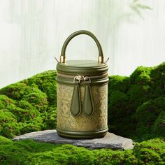 Song Brocade Leather Bucket Cylinder Bag - SinoCultural Luxury Handheld Portable Box Bag, Luxury Portable Handheld Box Bag, Luxury Portable Top Handle Box Bag, Luxury Portable Box Bag With Top Handle, Luxury Green Bucket Bag For Travel, Luxury Round Case Bag For Daily Use, Green Formal Bucket Bag, Green Luxury Bucket Bag For Formal Occasions, Travel Bag With Detachable Handle And Round Case