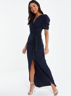 Make a statement in our Scuba Crepe Puff Sleeve Maxi Dress. Timeless navy color, dramatic puff sleeves, flowy maxi length. Dress it up or down! Model Is Wearing A Size 6 Runs Small, Please Size Up Wrap Skirt With Split Tie Wrap Belt At Waist Puff Sleeve Maxi Dress, Evening Dresses Online, Evening Dresses With Sleeves, Blue Evening Dresses, Maxi Dress Navy, Review Dresses, Sleeve Maxi Dress, Maxi Dress Blue, Maxi Dress With Sleeves