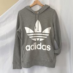 Grey Adidas Logo Hoodie Trendy Spring Hoodie With Logo Print, Adidas Logo Sporty Sweatshirt For Spring, Adidas Logo Hoodie For Fall In Athleisure Style, Adidas Logo Athleisure Hoodie For Fall, White Logo Print Hoodie For Spring, Casual Hoodie With Logo Print For Fall, Casual Fall Hoodie With Logo Print, Adidas Logo Hoodie Sweatshirt For Fall, Adidas Sweatshirt With Logo For Fall