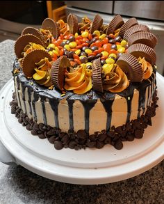 a chocolate cake with candy and candies on top