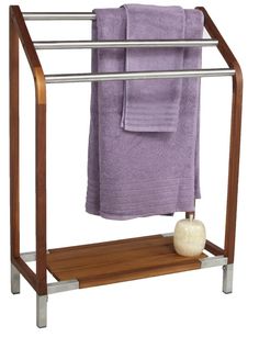 a towel rack with two purple towels on it and a white ball in the middle