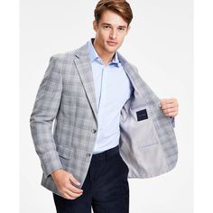 The sport coat for any occasion. Tommy Hilfiger's modern-fit plaid design works as effortlessly with your favorite button-downs and khakis as with date night attire. Notched lapels and a two-button closure provide a tailored look while spandex-blend fabric ensures all-day comfort. Side welt pocket and flap pockets add function while classic blue-and-gray plaid ensures timeless style. Lined interior maintains pristine condition wash after wash. Essential addition to any collection seeking one jac Tommy Hilfiger Notch Lapel Outerwear For Business Casual, Tommy Hilfiger Notch Lapel Blazer For Business Casual, Casual Plaid Blazer For Business, Tommy Hilfiger Notch Lapel Business Casual Outerwear, Tommy Hilfiger Tailored Blazer For Business Casual, Tommy Hilfiger Long Sleeve Blazer For Business Casual, Casual Plaid Sport Coat With Welt Pockets, Classic Plaid Sport Coat For Spring, Plaid Single Breasted Sport Coat For Spring