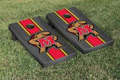 two wooden cornhole game boards with the university of miami logo on each one side