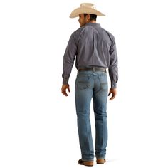 Cowboy tested, cowboy approved, our Pro Series jeans can handle hard work and hard wear. Twice as durable as traditional denim and reinforced in key areas, they have classic Western styling and a simple back pocket. The straight-leg M5 is fitted through the seat and thigh for a modern yet classic look. M5 Straight Stretch Pro Series Ray Straight | Product Features : 0 : No-rub comfort inseam|Seven belt loops with anchored reinforcement in key wear zones, 1 : Heavy-duty zippers and hardware, 2 : Extra deep front pockets|Double-lined front and back pockets|Reinforced back pockets | Men's M5 Straight Stretch Pro Series Ray Pants in Hamilton, Size: 40 X 34 by Ariat Hard Work, Classic Looks, Stretch Denim, Straight Leg Jeans, Product Features, Heavy Duty, Straight Leg, Pants, How To Wear