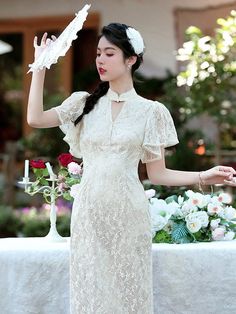 Summer collection, midi Qipao with lotus sleeves#qipaodress #chinesedress#cheongsamdress#modernqipao#moderncheongsam Fitted Lace Ao Dai For Ceremony, Elegant Ao Dai With Stand Collar For Wedding, Elegant Ao Dai With Stand Collar For Ceremony, Elegant Embroidered Fitted Ao Dai, White Cheongsam With Stand Collar For Wedding, Elegant Embroidered Cheongsam With Stand Collar, Elegant Ao Dai With Floral Embroidery, Elegant Fitted Ao Dai With Floral Embroidery, Wedding Cheongsam With Stand Collar And Embroidery