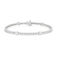 This diamond bracelet's design brings boldness to the classic tennis bracelet. It features marquise-cut diamonds on golden marquise bezels set on evenly-spaced stations along a continuous line of prong-set round diamonds. The elongated elliptical diamonds with pointed ends add a touch of daring sophistication to this piece, while the distinguishable marquise bezels give this bracelet a rebellious edge. Diamond Bracelet Design, Floral Pendant, Marquise Cut Diamond, Diamond Bracelets, Tennis Bracelet, Gold Platinum, Earrings Collection, Lab Diamonds, Custom Rings