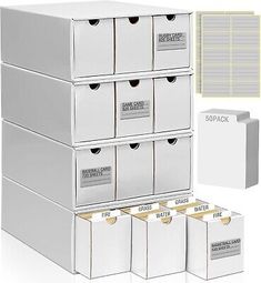 a stack of white boxes with labels on them