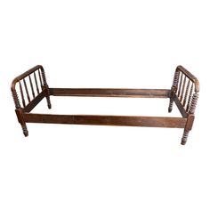 an old wooden bed frame with no headboard and foot board on the bottom, against a white background